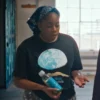 Dionne Brown Queenie One World Two Channels T-Shirt
